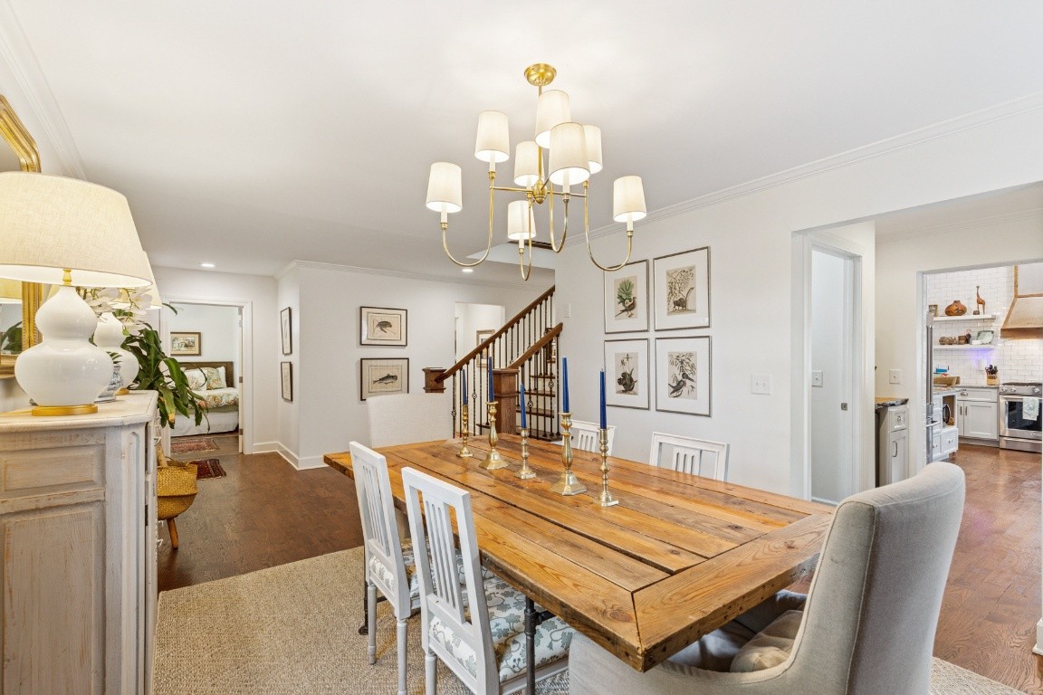 210 Cherokee Road Nashville, TN 37205 - Photo 9 of 56 a room with table chairs and wooden floor