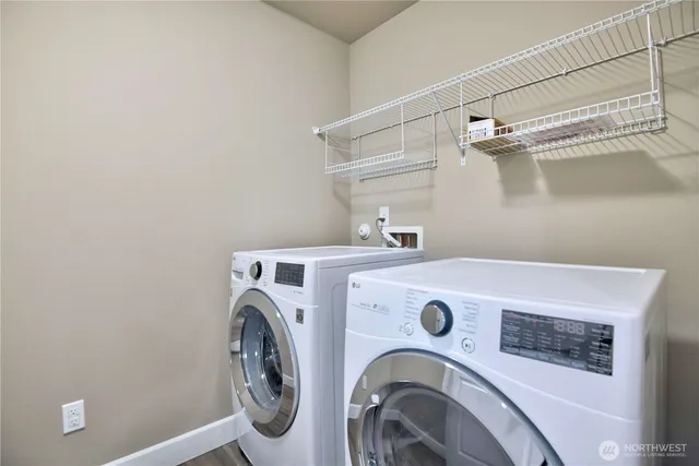 a utility room with dryer and washer