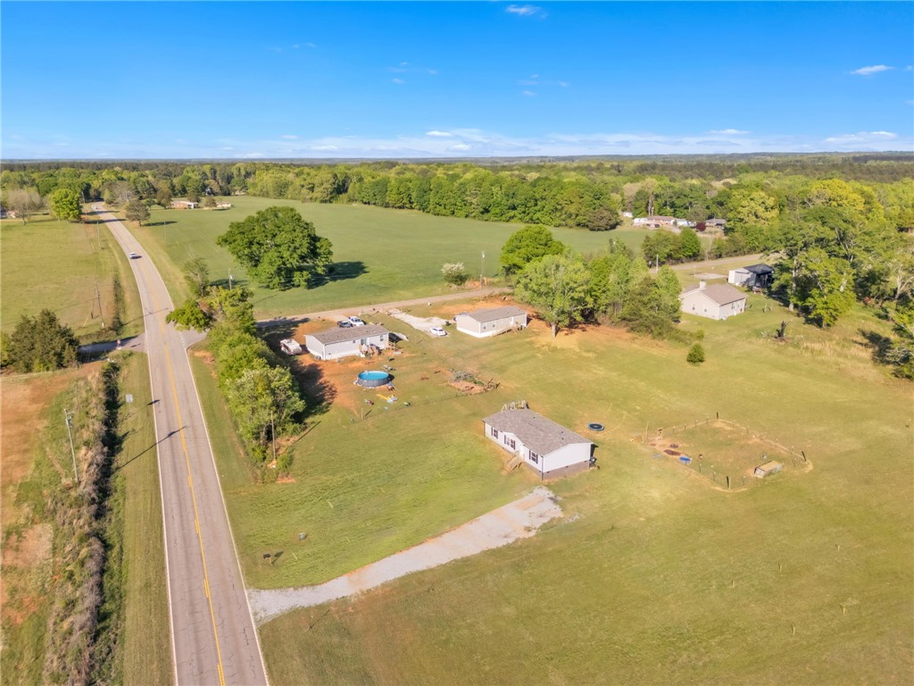 5303 Highway 413 Iva, SC 29655 - Photo 26 of 27 Expansive green acreage offers serene country living with several homesites and mature trees.