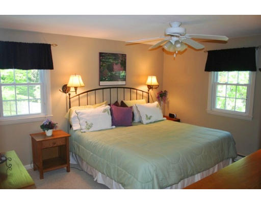 5 Brady Rd Extension Westborough, MA 01581 - Photo 11 of 16 a bedroom with a bed and a window