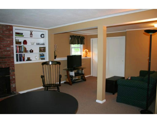 5 Brady Rd Extension Westborough, MA 01581 - Photo 15 of 16 a living room with furniture and a flat screen tv