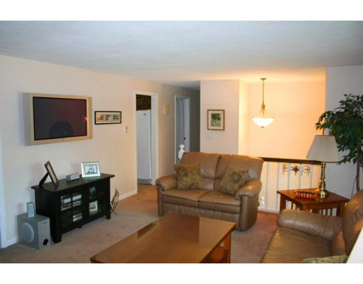5 Brady Rd Extension Westborough, MA 01581 - Photo 9 of 16 a living room with furniture and a flat screen tv