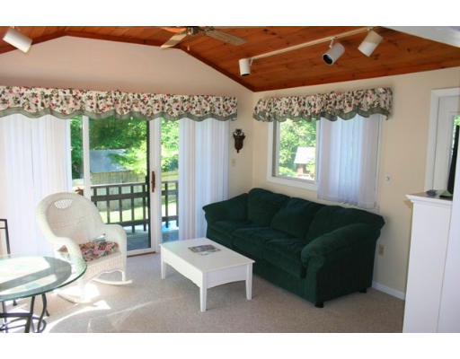 5 Brady Rd Extension Westborough, MA 01581 - Photo 10 of 16 a living room with furniture and a floor to ceiling window