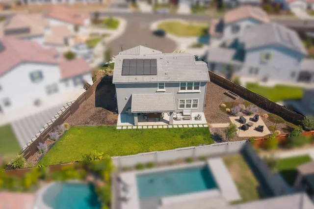 a view of a back yard of the house