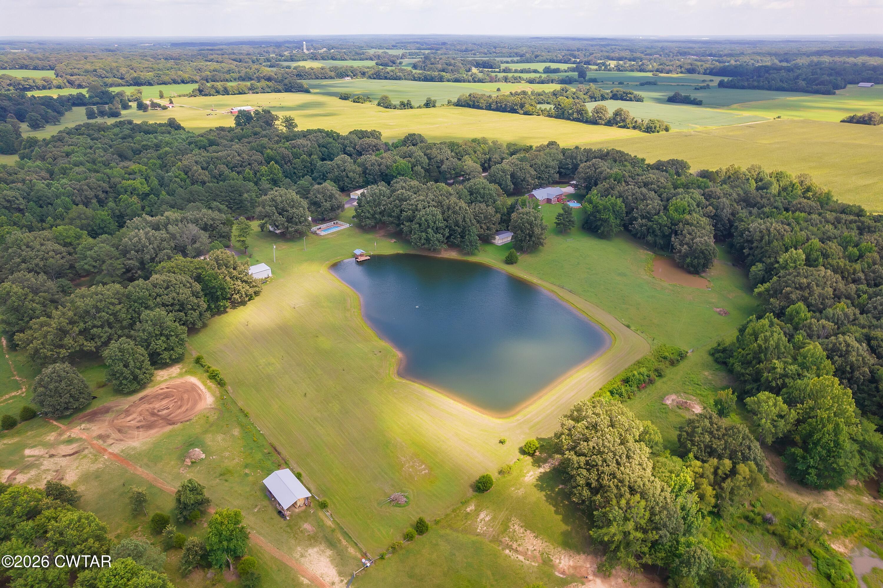 2757 Edward Williams Road Gadsden, TN 38337 - Photo 51 of 57 a view of a lake with a mountain