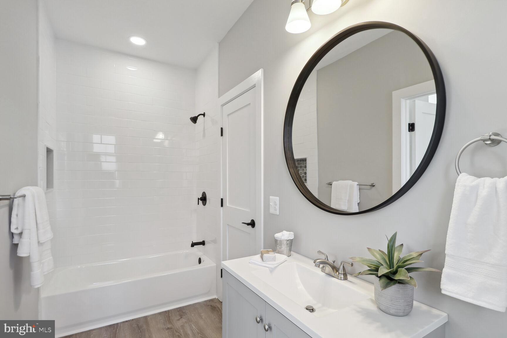 7844 Bertha Road Pasadena, MD 21122 - Photo 15 of 43 Main level full bathroom