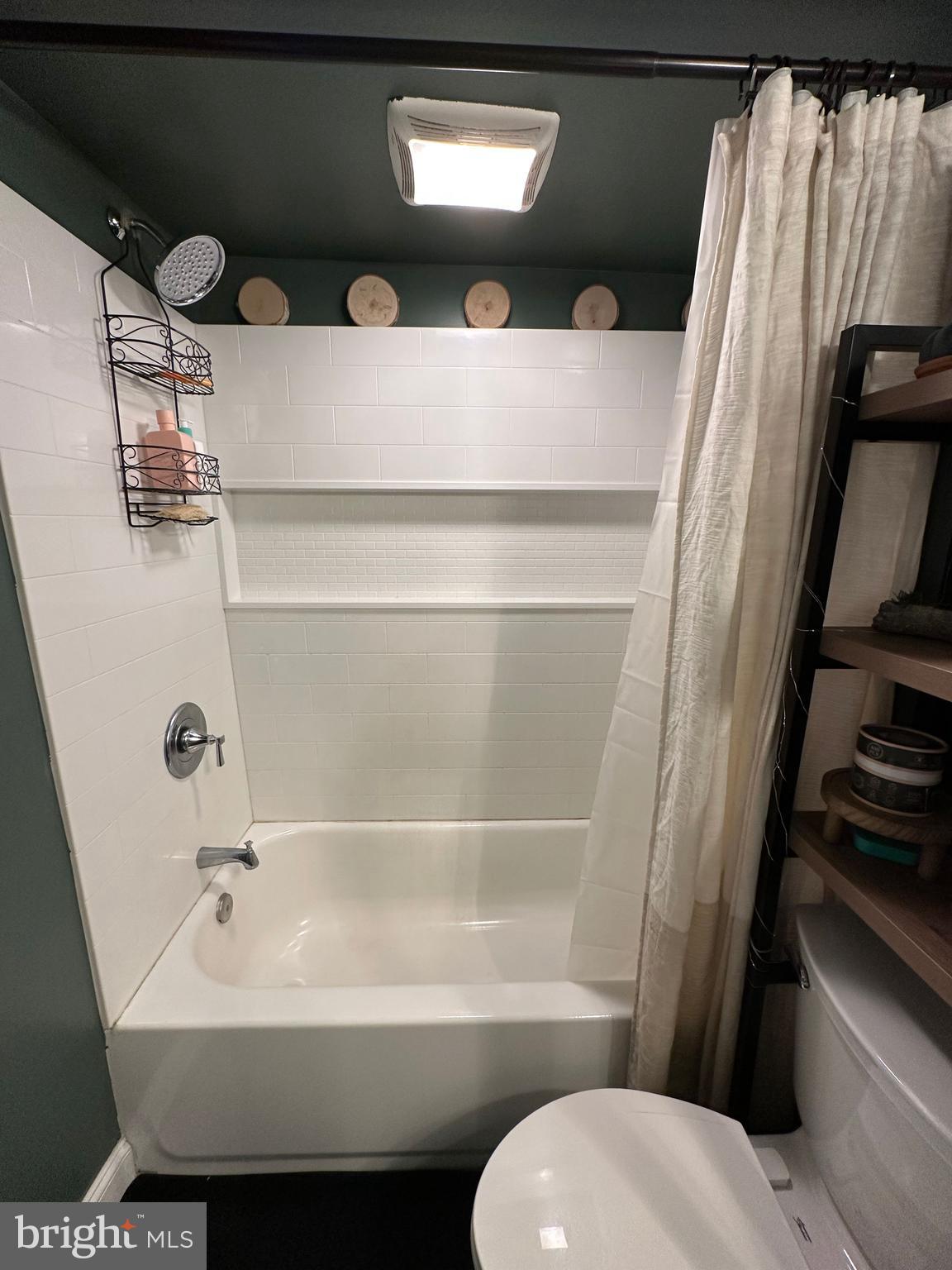 203 Mill Street Mount Holly, NJ 08060 - Photo 11 of 19 a bathroom with a sink a toilet and shower