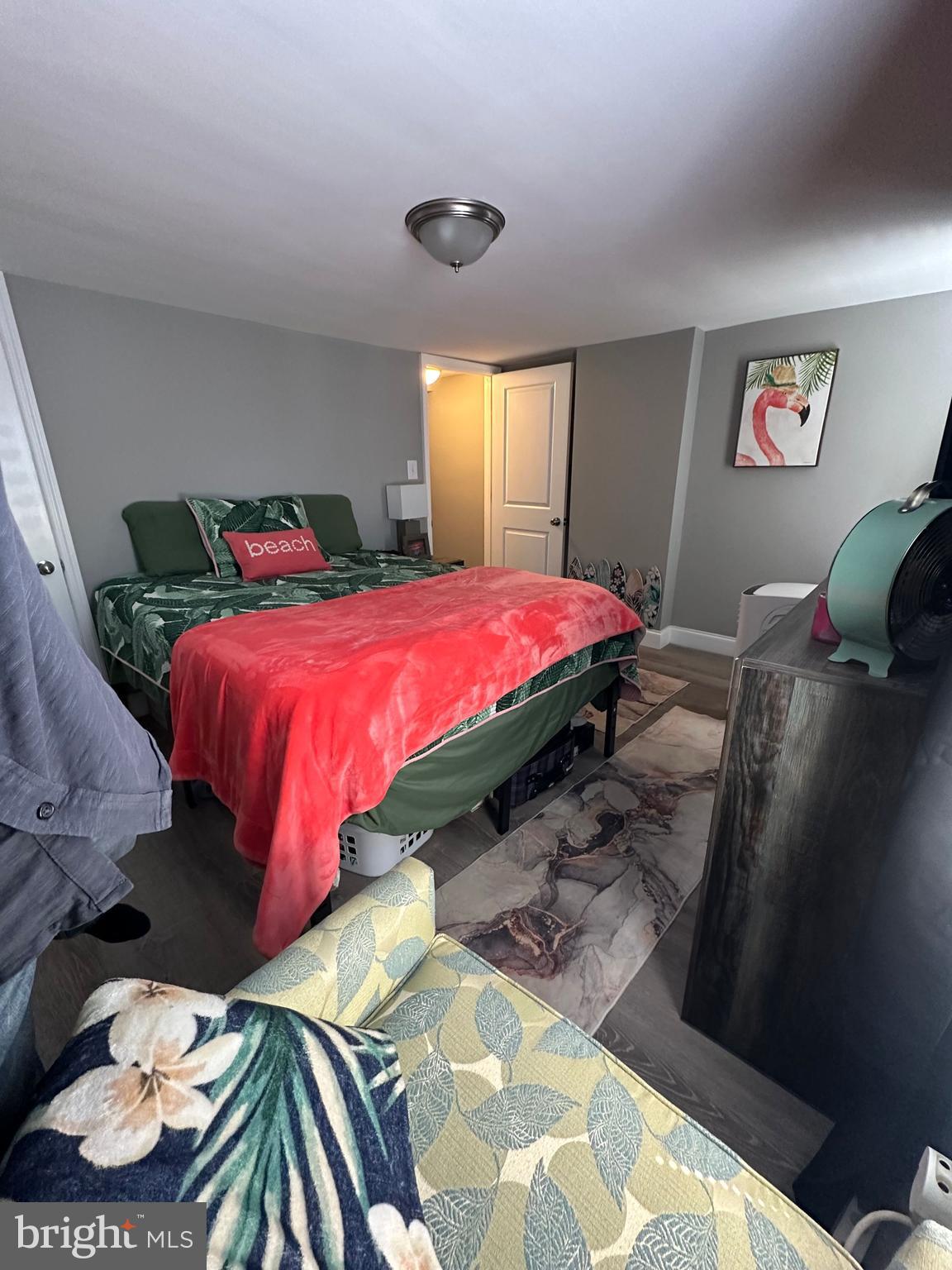 203 Mill Street Mount Holly, NJ 08060 - Photo 16 of 19 a bedroom with a bed and a window