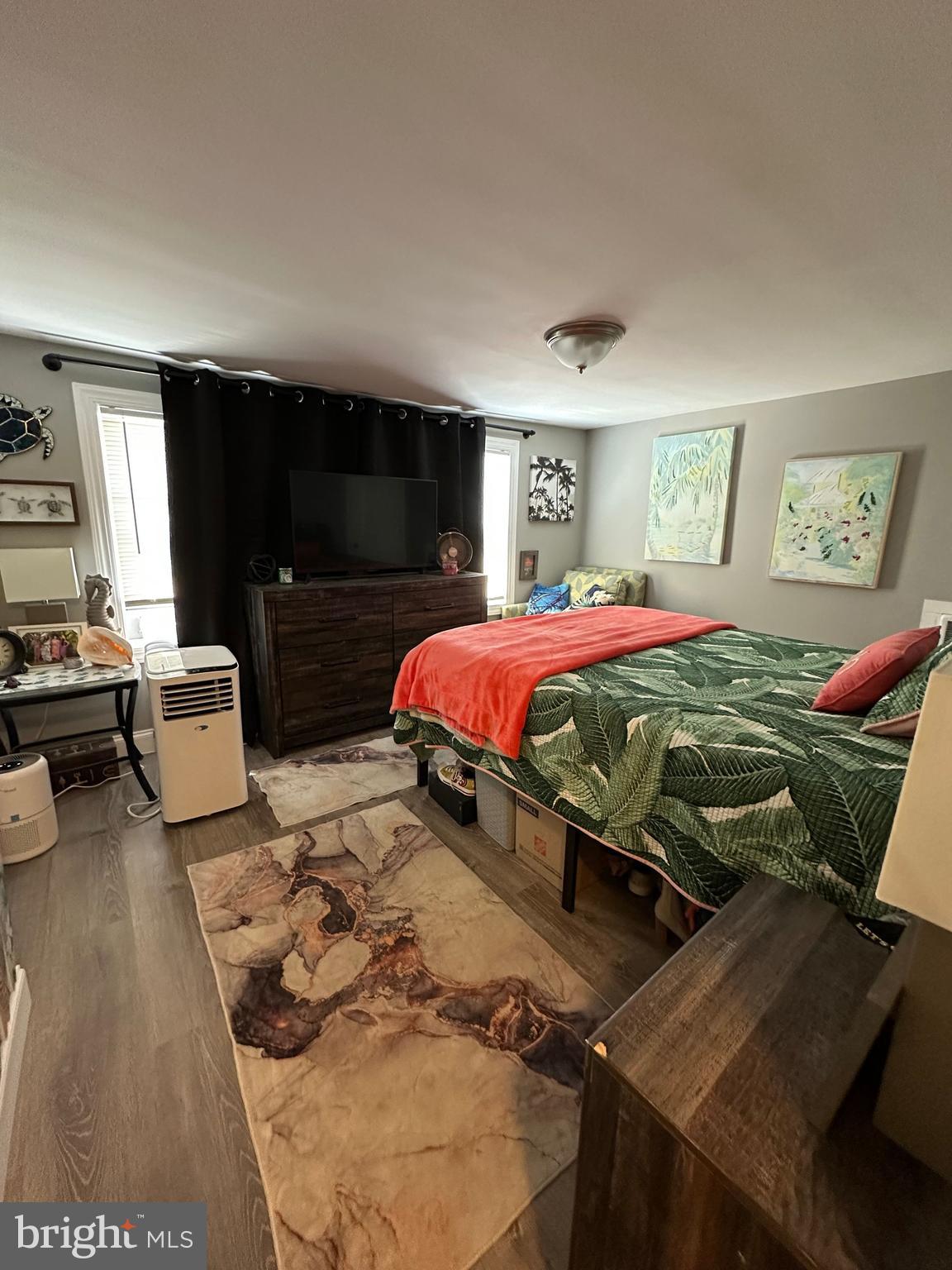 203 Mill Street Mount Holly, NJ 08060 - Photo 17 of 19 a bedroom with a bed and glass window