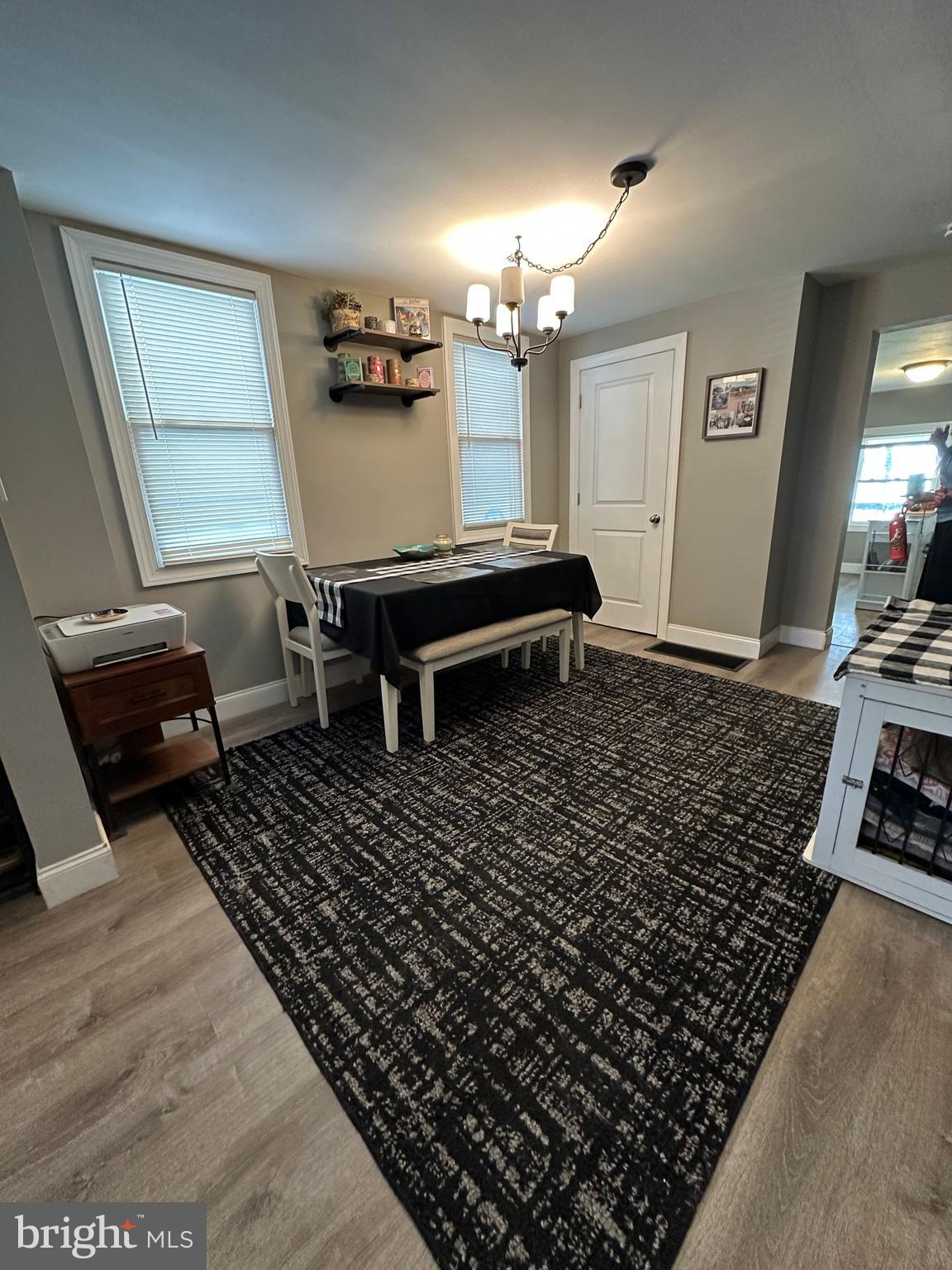 203 Mill Street Mount Holly, NJ 08060 - Photo 5 of 19 a living room with a couch and a piano