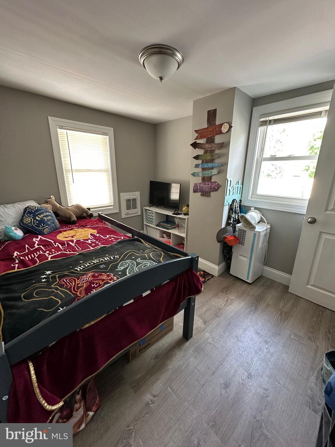 203 Mill Street Mount Holly, NJ 08060 - Photo 10 of 19 a bedroom with a bed and a window