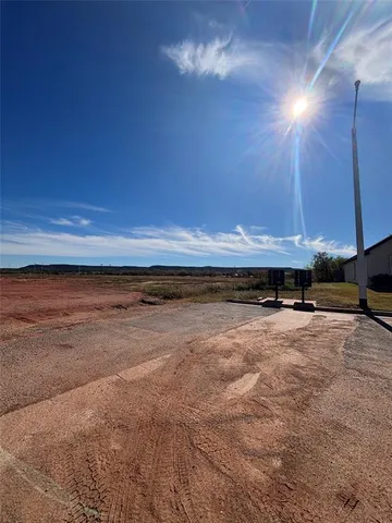 a view of a room with a fireplace