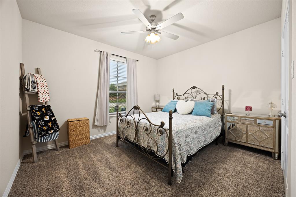 2618 Byrd Ranch Road Midlothian, TX 76065 - Photo 27 of 38 a bed room with a bed and a chair