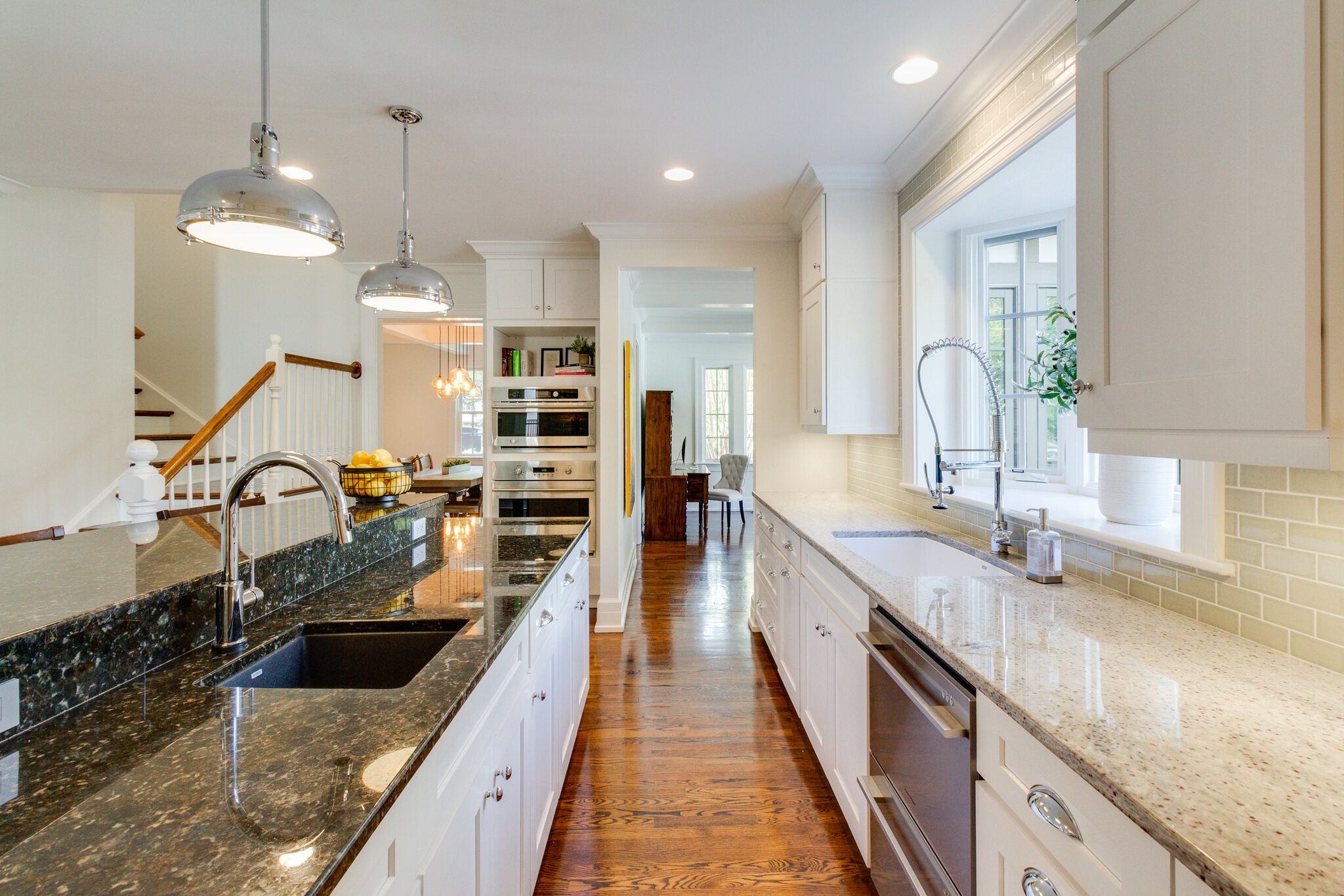 116 Mockingbird Road Nashville, TN 37205 - Photo 22 of 43 a large kitchen with kitchen island a large counter space a sink and stainless steel appliances