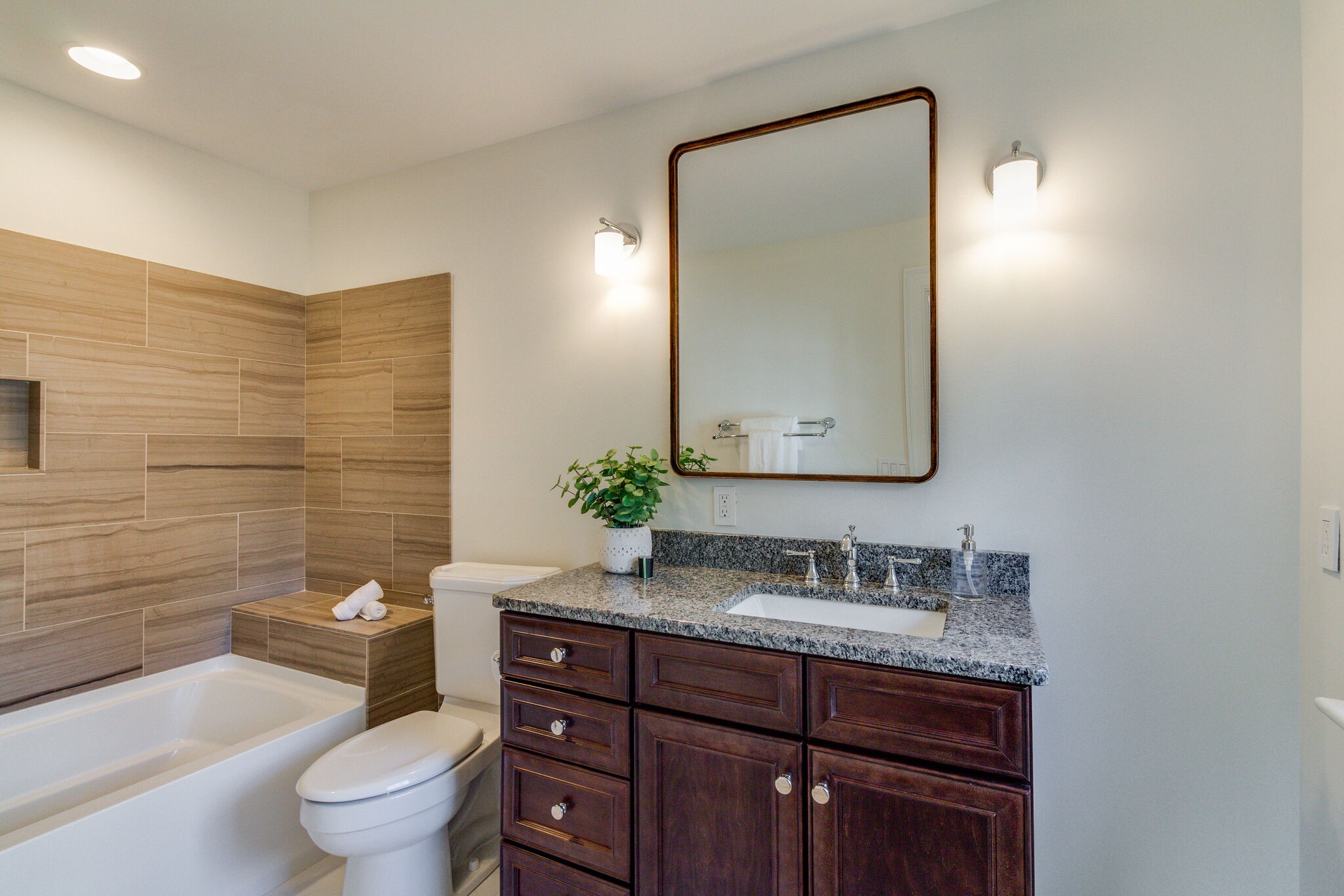 116 Mockingbird Road Nashville, TN 37205 - Photo 32 of 43 a bathroom with a granite countertop toilet a sink and a mirror