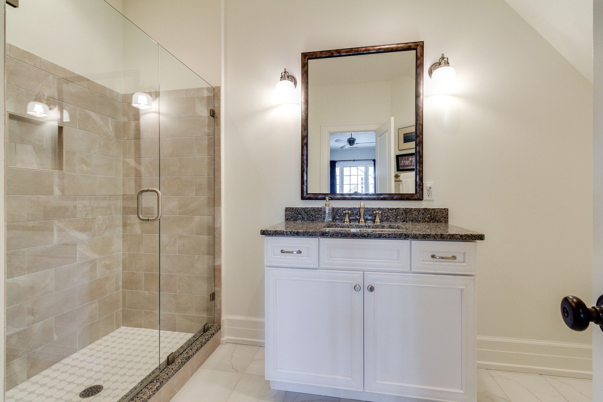 116 Mockingbird Road Nashville, TN 37205 - Photo 34 of 43 a bathroom with a shower a sink and a mirror