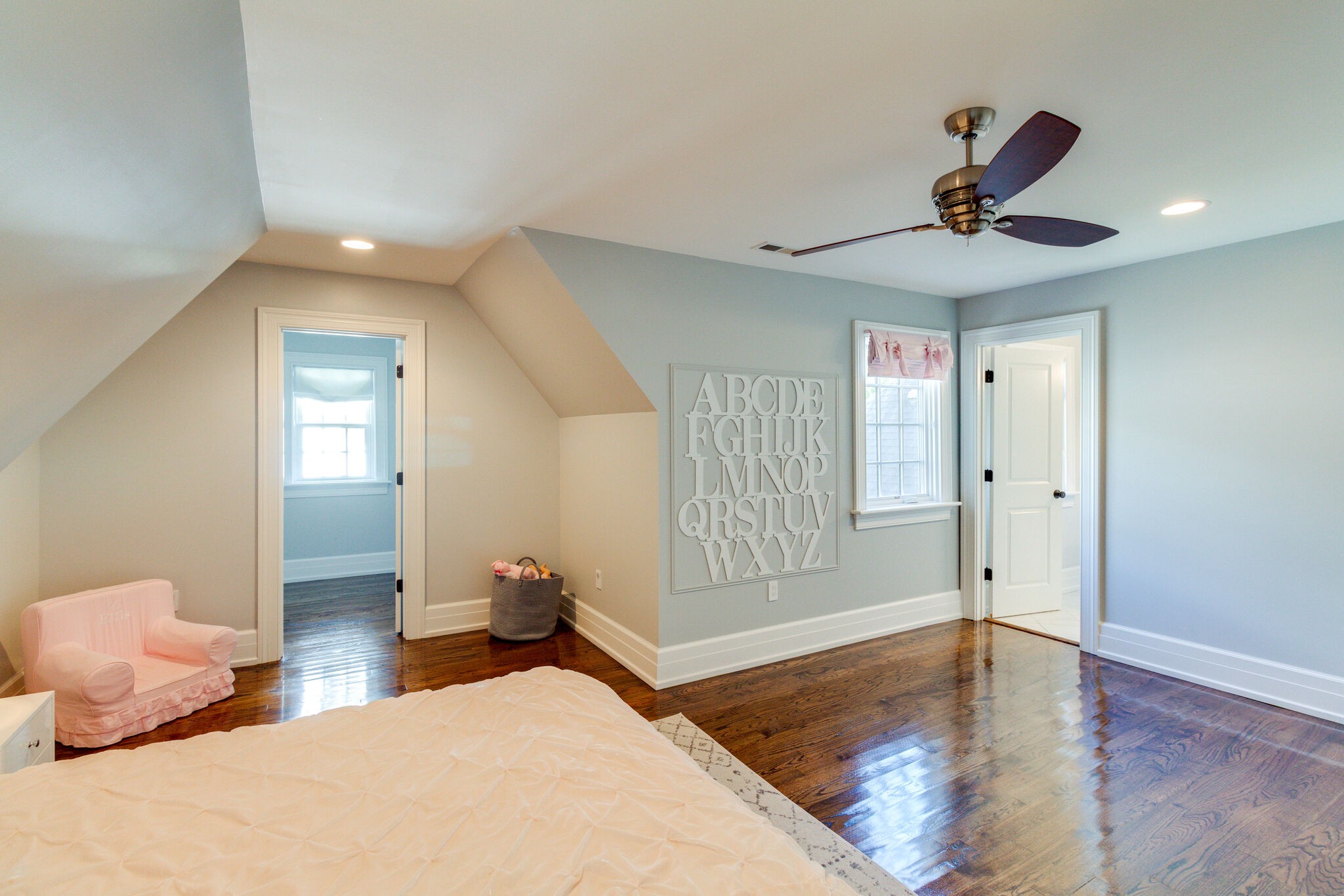 116 Mockingbird Road Nashville, TN 37205 - Photo 36 of 43 a bedroom with a large bed and a chandelier fan