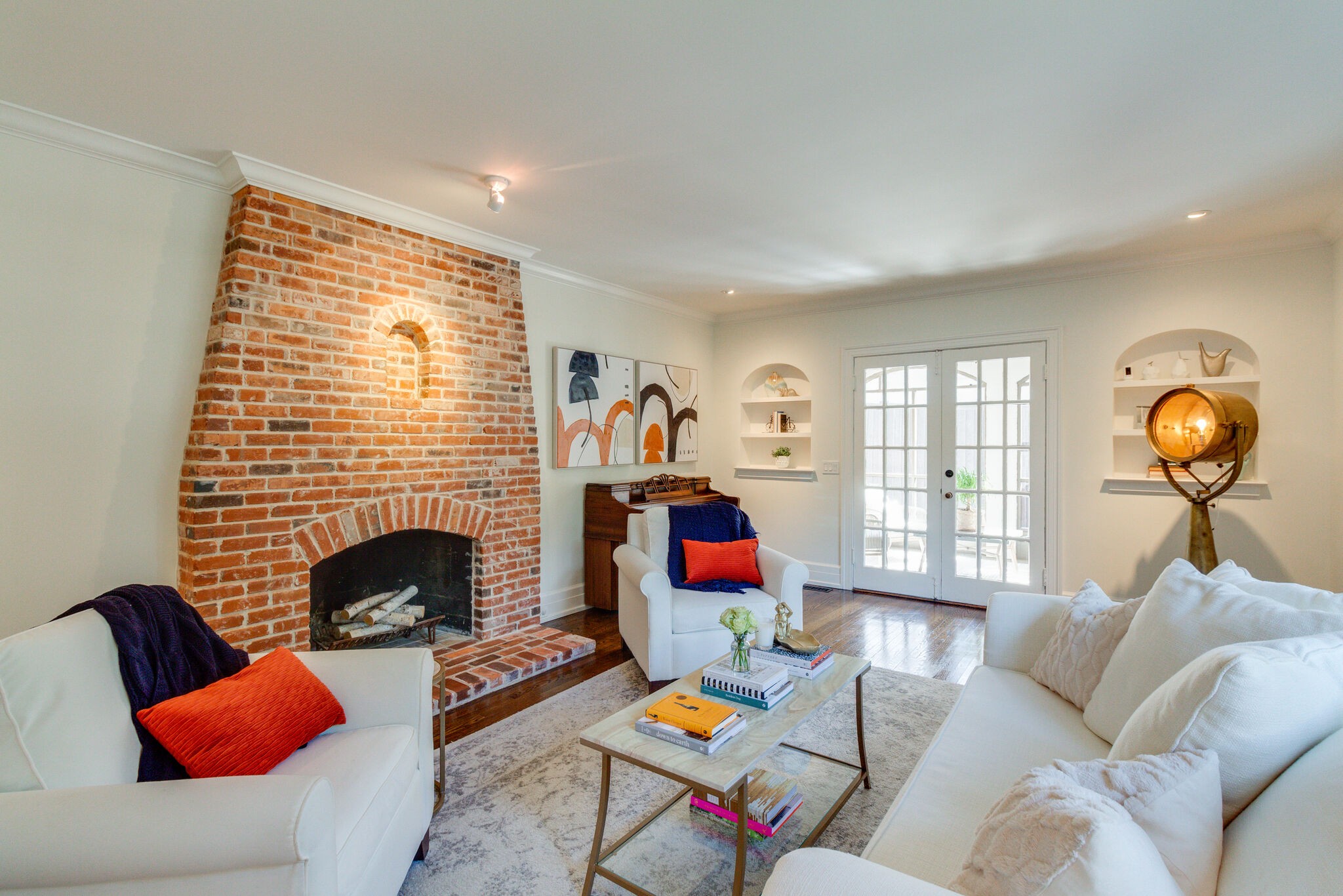 116 Mockingbird Road Nashville, TN 37205 - Photo 8 of 43 a living room with furniture windows and a fireplace