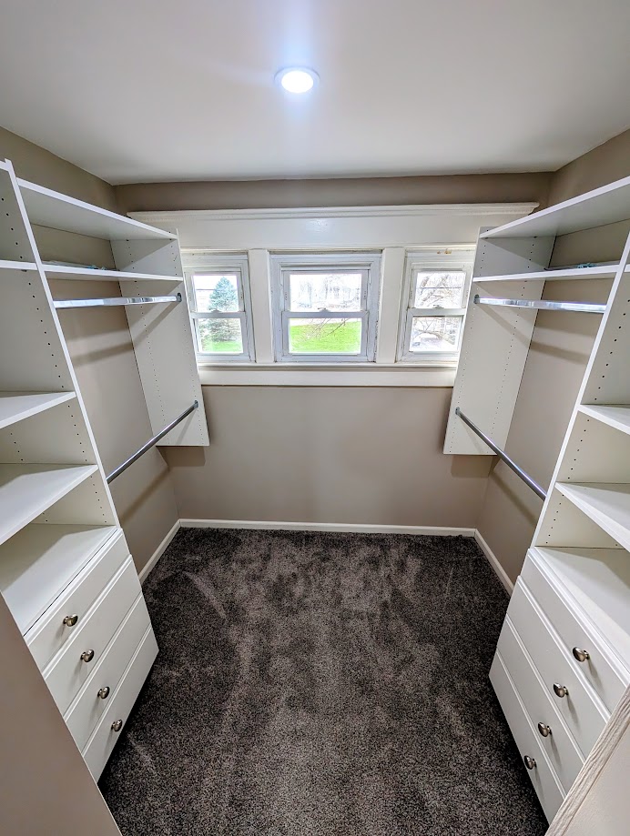 10796 Preble County Line Road Brookville, OH 45309 - Photo 23 of 33 This organized walk-in closet features ample storage and natural light.