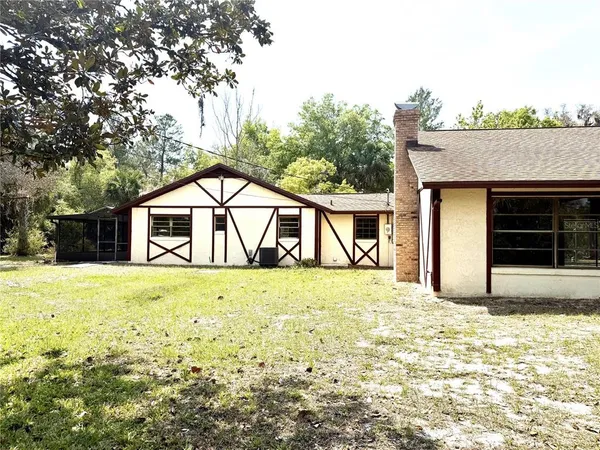 a front view of a house with a garage