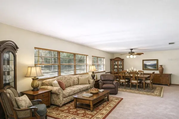 a view of swimming pool with a backyard