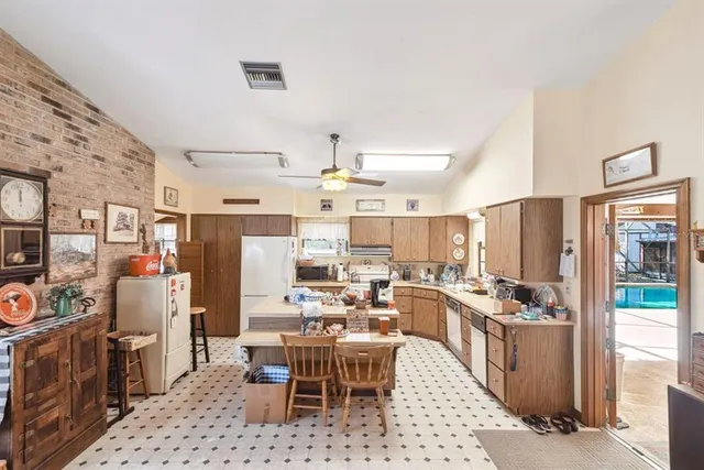 a large kitchen with lots of counter top space