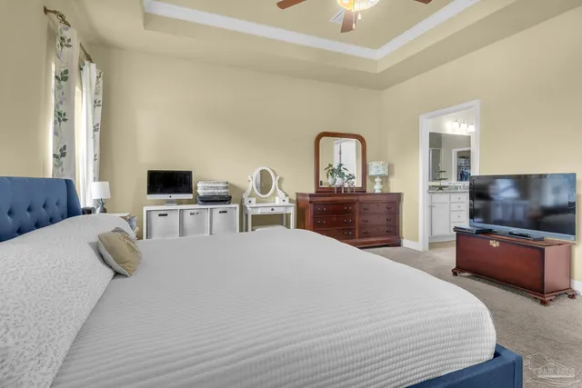 a bedroom with a bed and furniture