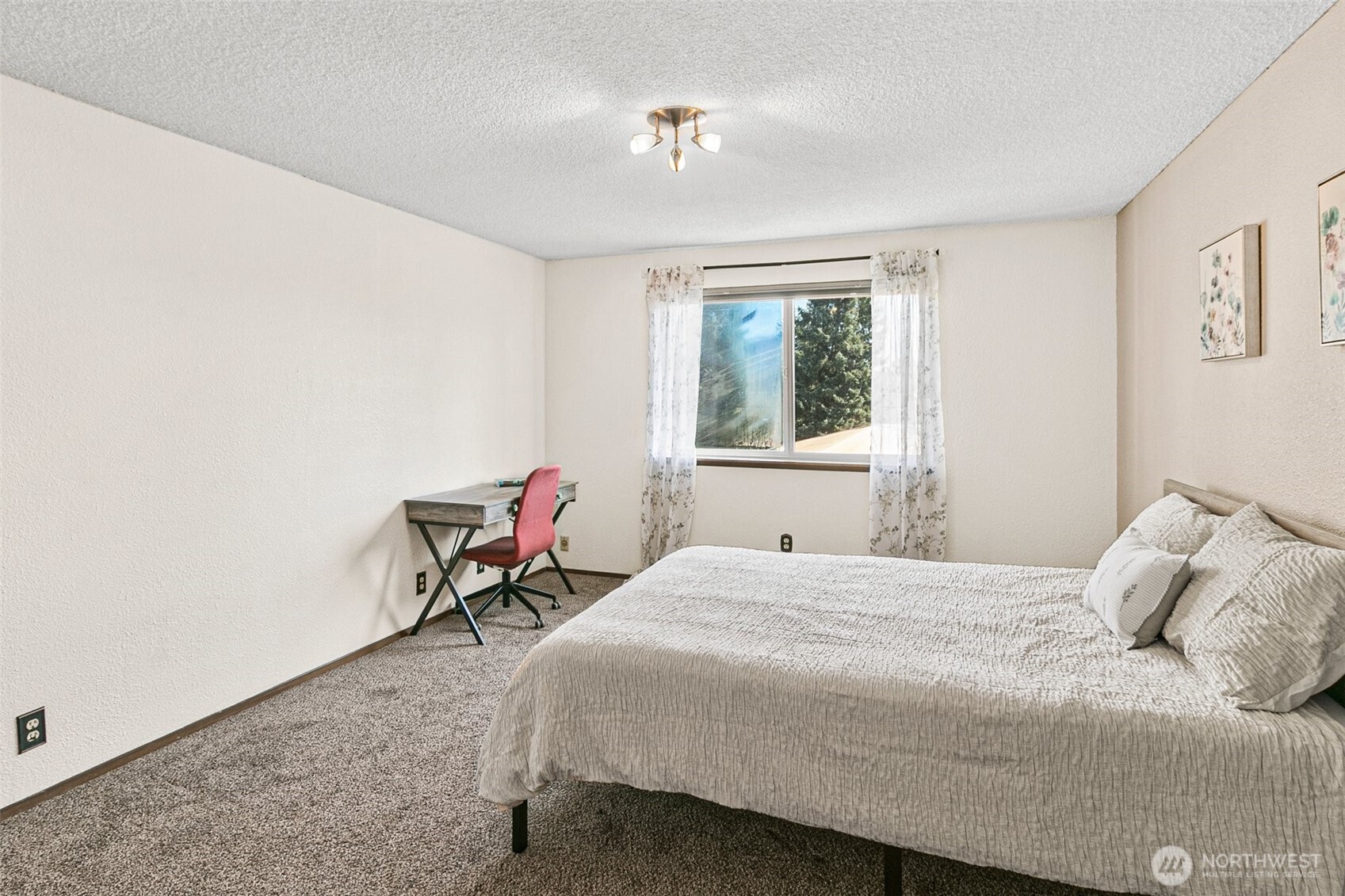 2520 Cascade Place West, Unit 2520 University Place, WA 98466 - Photo 18 of 35 a bedroom with a bed and a window