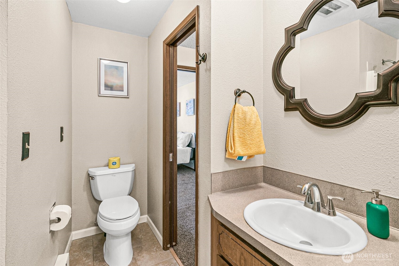 2520 Cascade Place West, Unit 2520 University Place, WA 98466 - Photo 19 of 35 a bathroom with a toilet sink and mirror