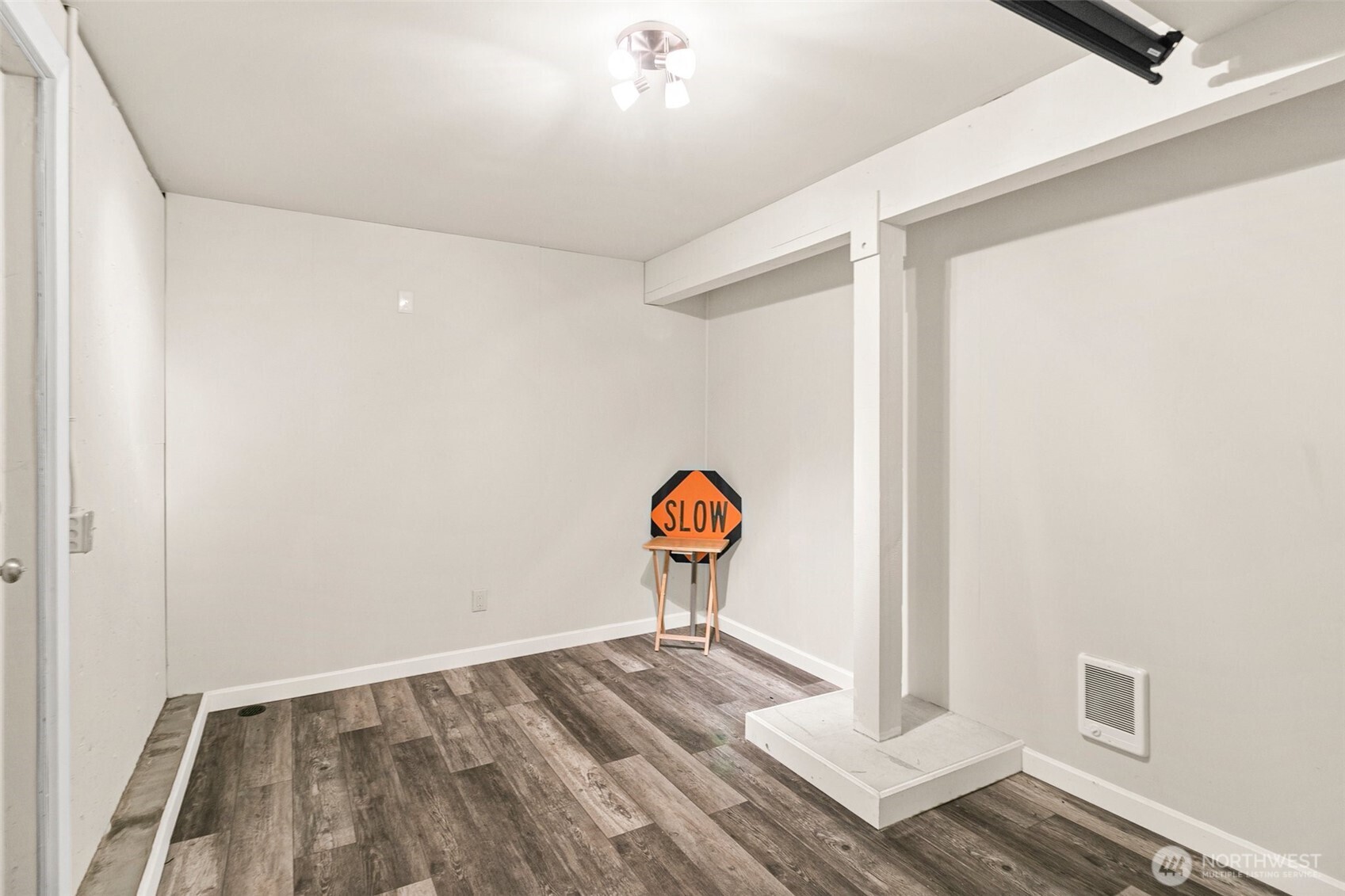 2520 Cascade Place West, Unit 2520 University Place, WA 98466 - Photo 27 of 35 a view of water heater room with wooden floor