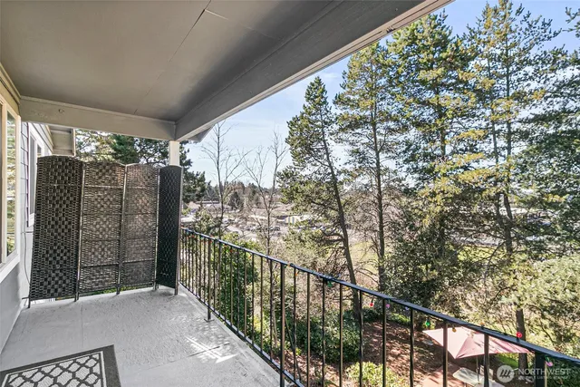 a view of balcony with furniture