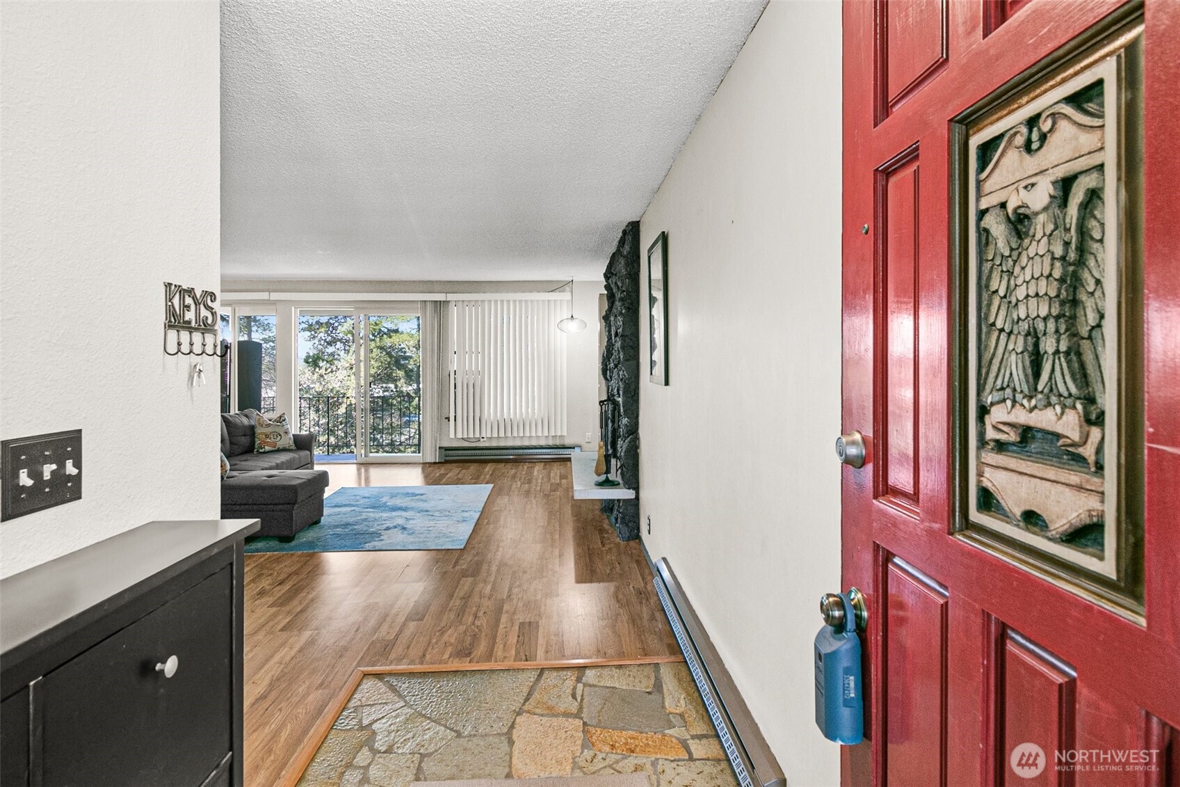 2520 Cascade Place West, Unit 2520 University Place, WA 98466 - Photo 3 of 35 a living room with furniture and a large window