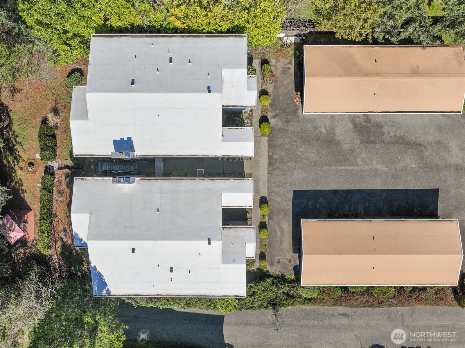 2520 Cascade Place West, Unit 2520 University Place, WA 98466 - Photo 34 of 35 an aerial view of residential house with outdoor space and parking