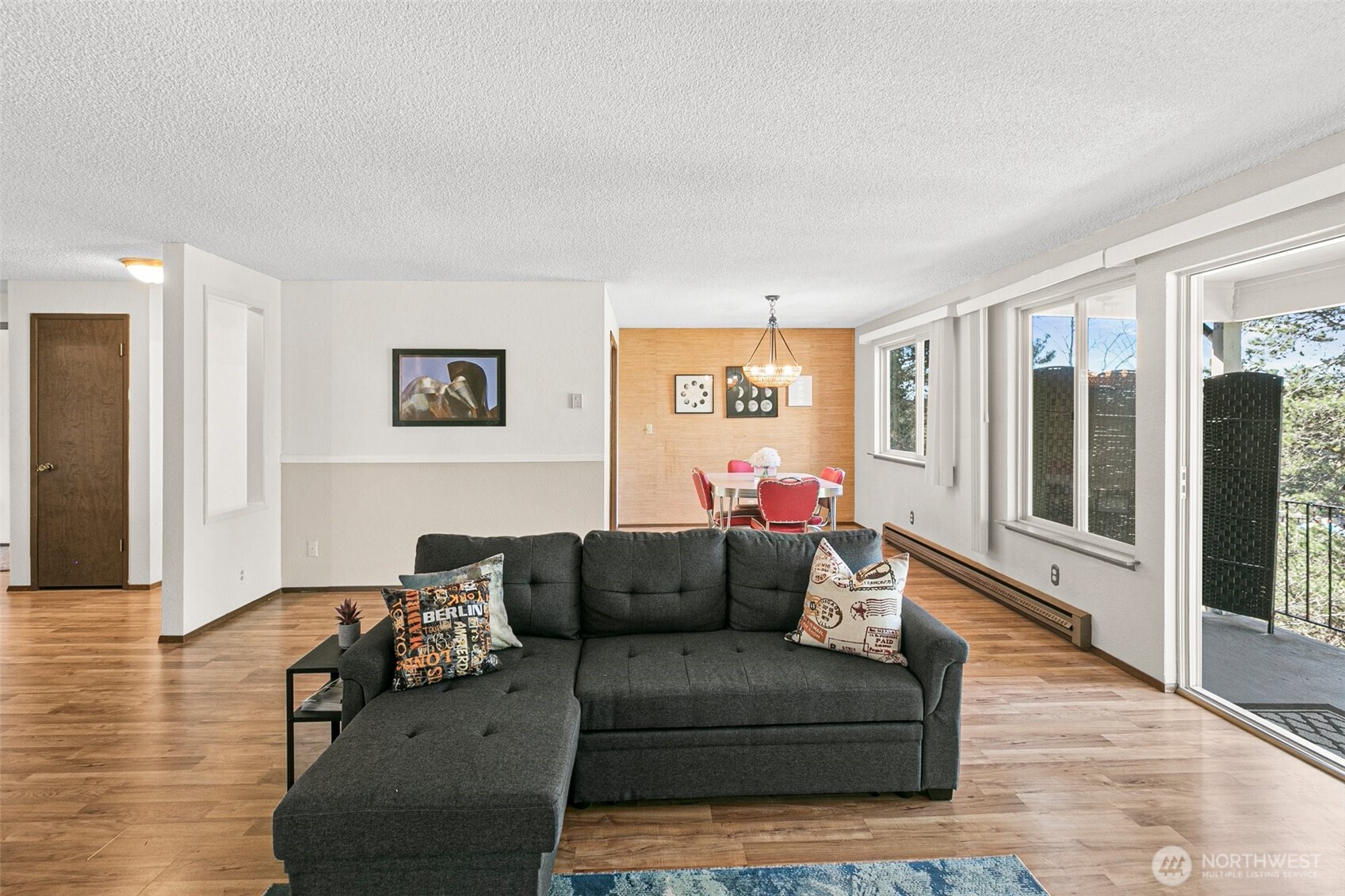 2520 Cascade Place West, Unit 2520 University Place, WA 98466 - Photo 4 of 35 a living room with furniture and a large window