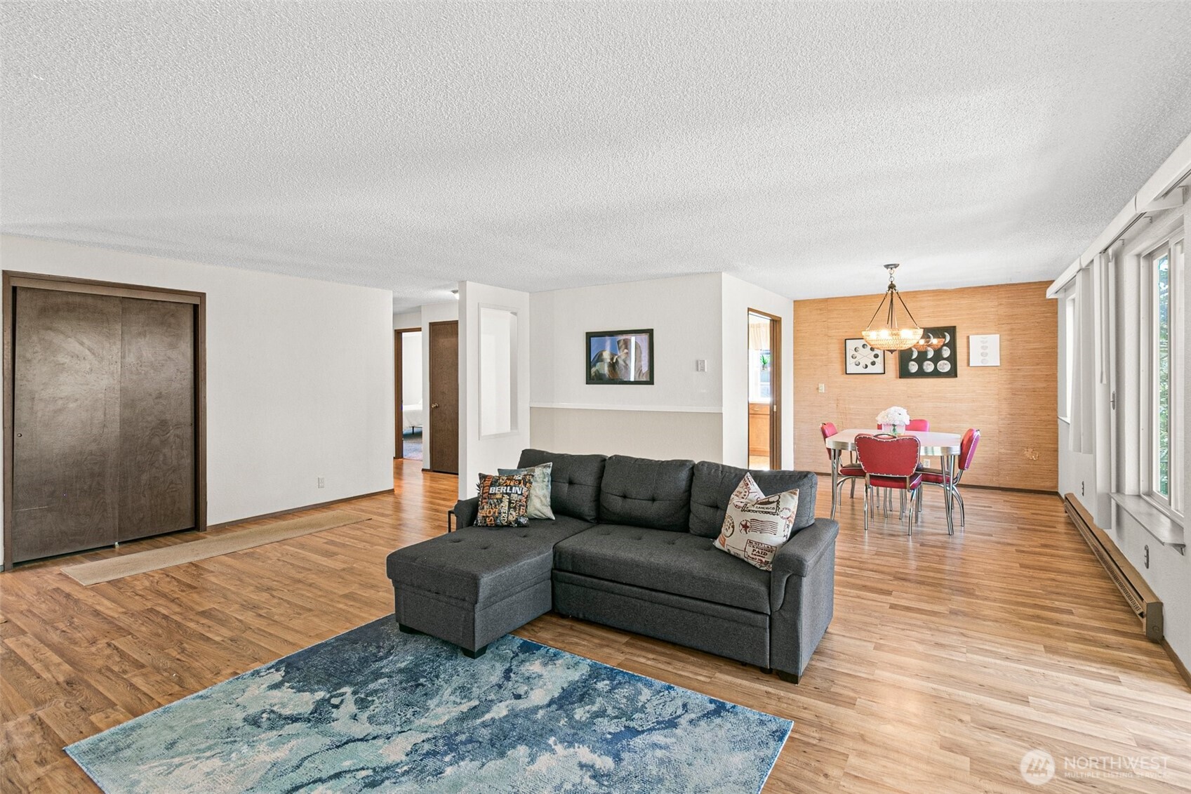 2520 Cascade Place West, Unit 2520 University Place, WA 98466 - Photo 5 of 35 a living room with furniture and wooden floor