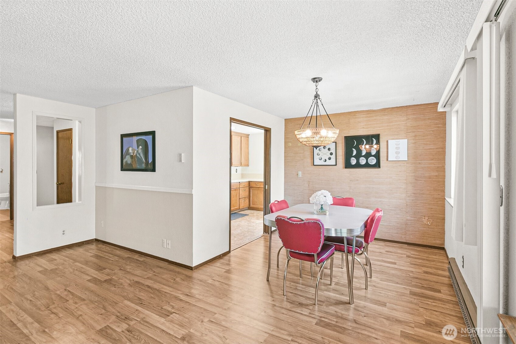 2520 Cascade Place West, Unit 2520 University Place, WA 98466 - Photo 6 of 35 a view of a dining room with furniture window and wooden floor