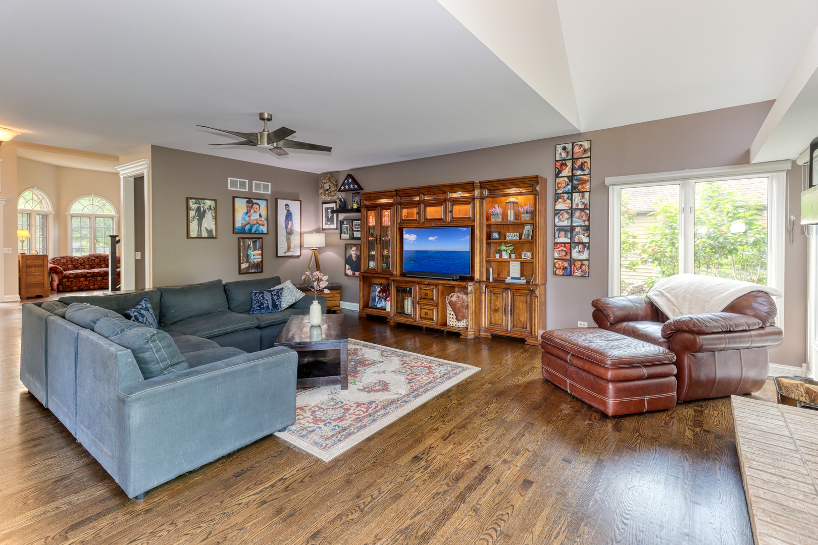 741 Merrill New Road Sugar Grove, IL 60554 - Photo 11 of 42 a living room with furniture and a flat screen tv