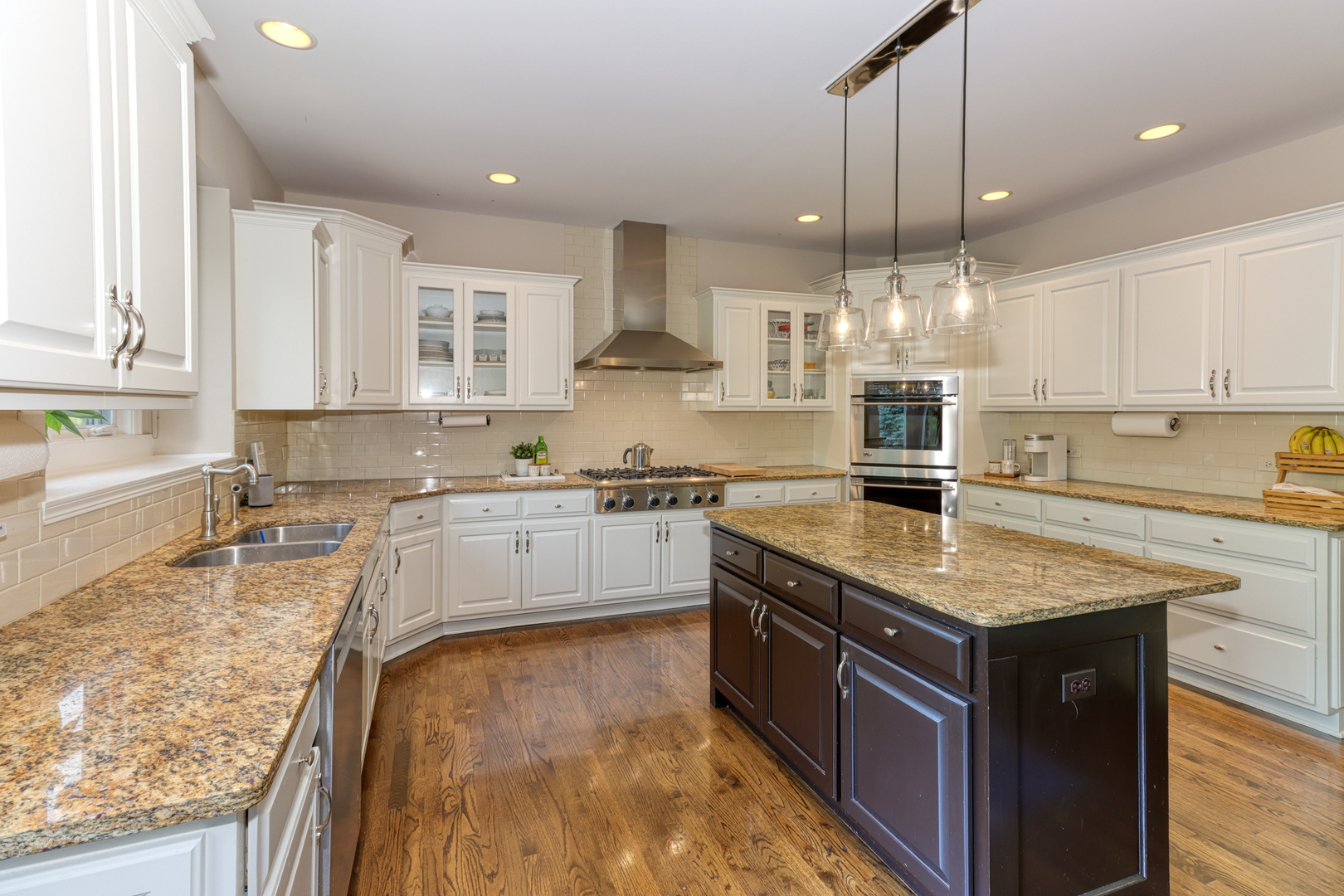 741 Merrill New Road Sugar Grove, IL 60554 - Photo 15 of 42 a large kitchen with stainless steel appliances granite countertop a sink a stove and a granite counter tops