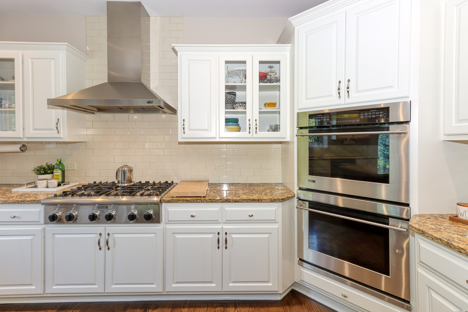 741 Merrill New Road Sugar Grove, IL 60554 - Photo 16 of 42 a kitchen with granite countertop a stove and a sink