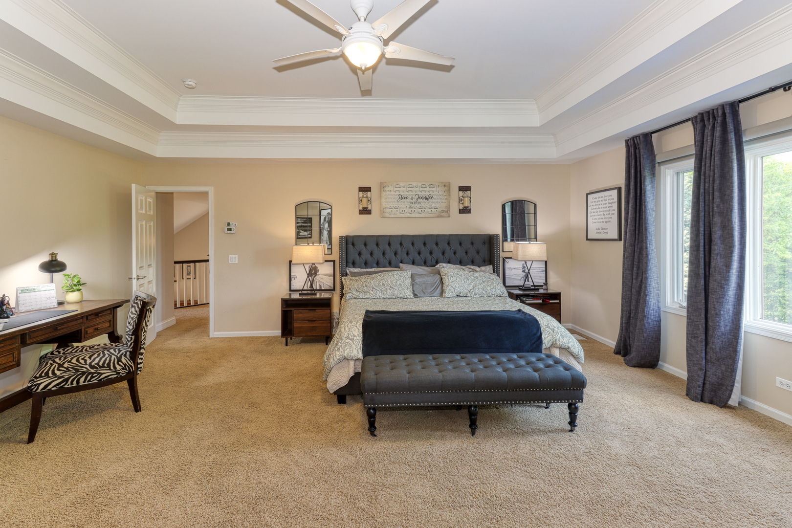 741 Merrill New Road Sugar Grove, IL 60554 - Photo 31 of 42 a bedroom with a bed and a chandelier
