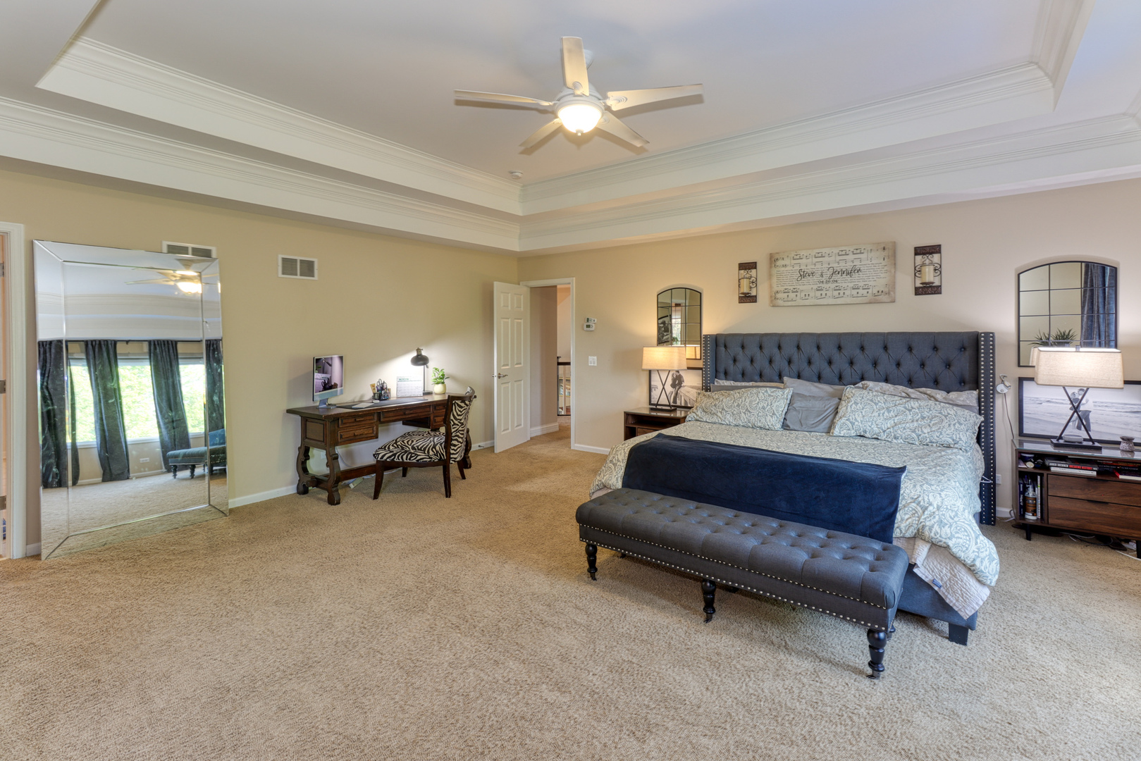 741 Merrill New Road Sugar Grove, IL 60554 - Photo 32 of 42 a living room with furniture and a chandelier