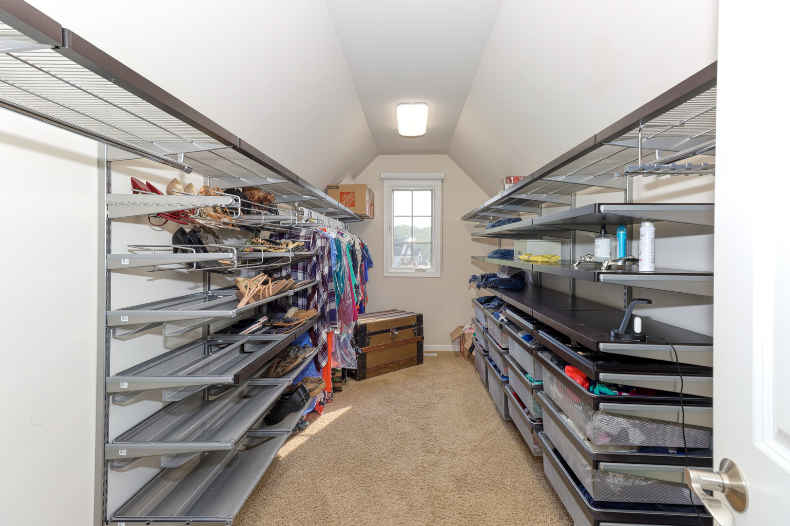 741 Merrill New Road Sugar Grove, IL 60554 - Photo 33 of 42 a view of walk in closet with clothes and shoes