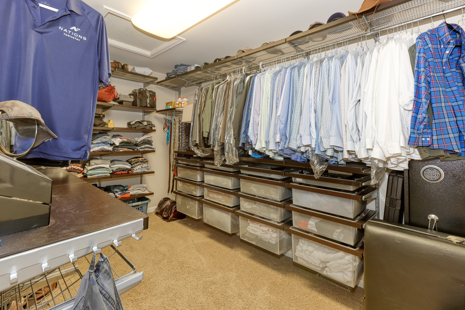 741 Merrill New Road Sugar Grove, IL 60554 - Photo 34 of 42 a view of walk in closet with clothes and shoes