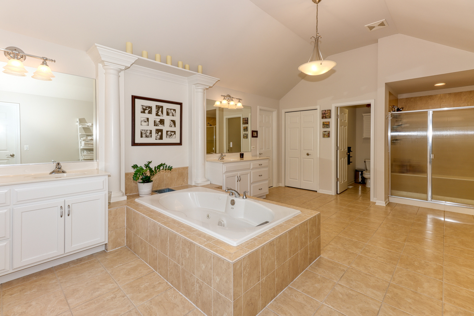 741 Merrill New Road Sugar Grove, IL 60554 - Photo 35 of 42 a bathroom with a tub a sink a mirror and a shower