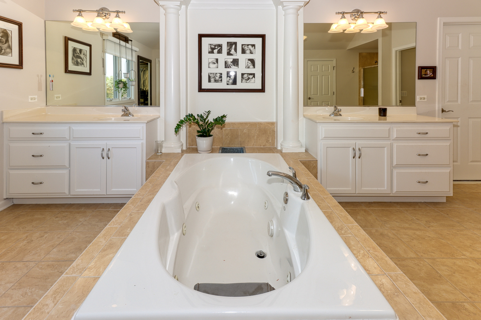 741 Merrill New Road Sugar Grove, IL 60554 - Photo 36 of 42 a spacious bathroom with a tub sink and mirror