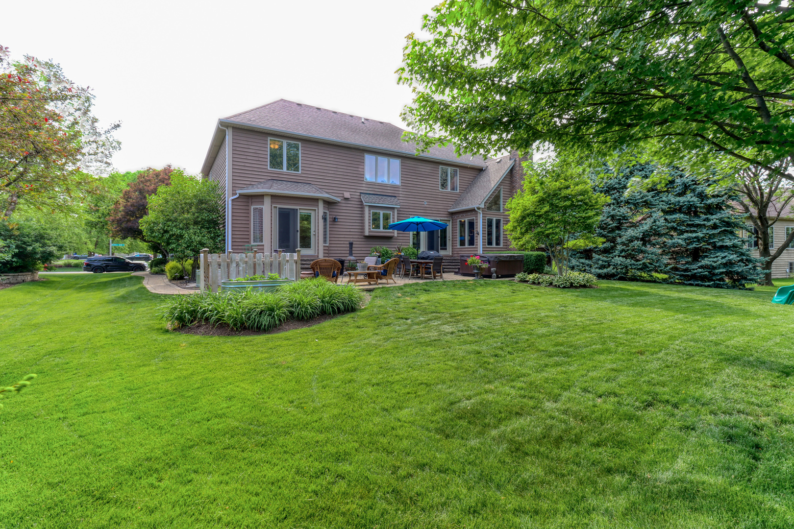 741 Merrill New Road Sugar Grove, IL 60554 - Photo 41 of 42 a front view of a house with garden
