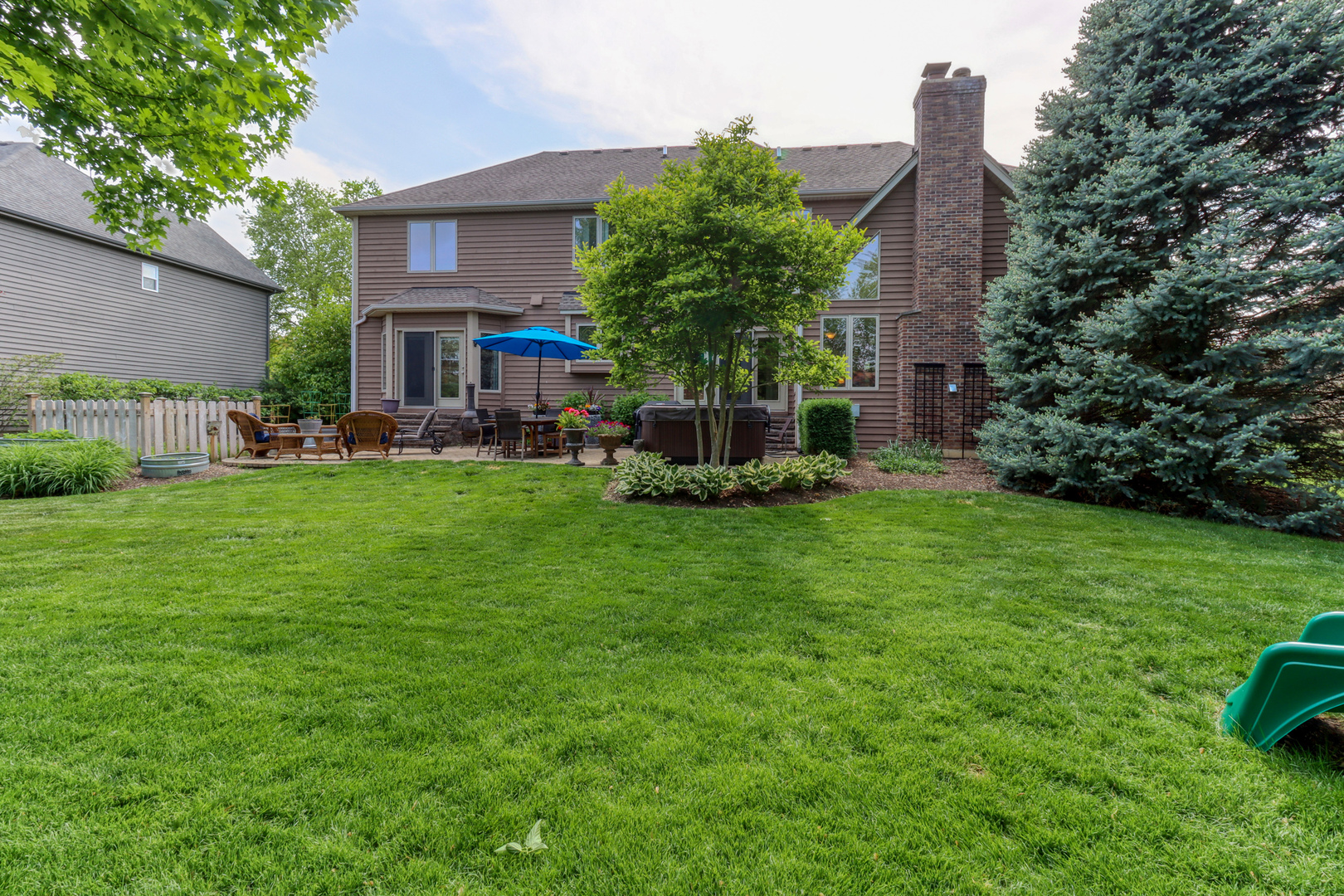 741 Merrill New Road Sugar Grove, IL 60554 - Photo 42 of 42 a view of a house with a yard and sitting area