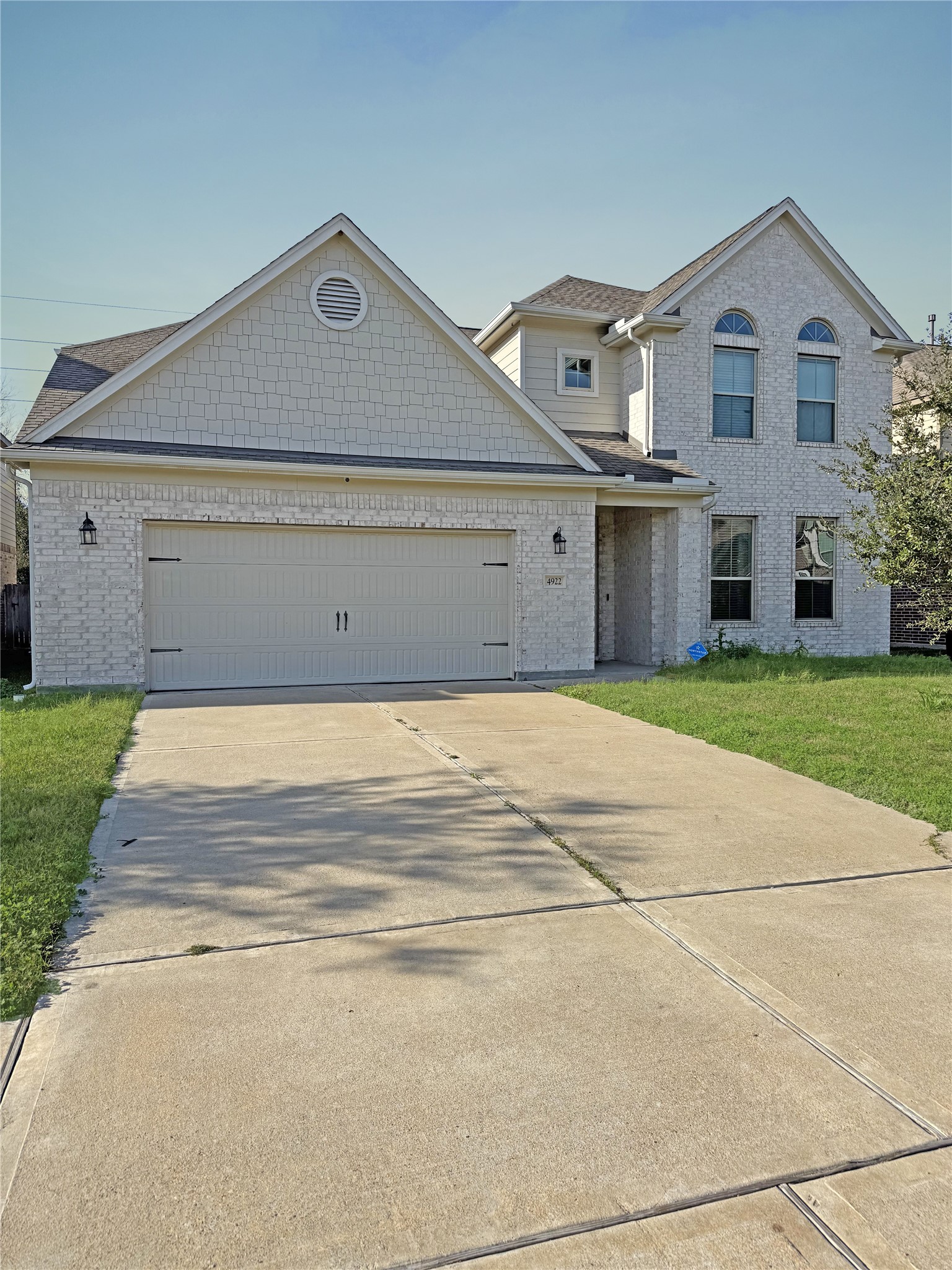 4922 Lacebark Pne Trail Rosenberg, TX 77471 - Photo 1 of 22 a front view of a house with a garden and garage