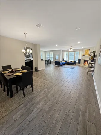 a view of a kitchen and dining room