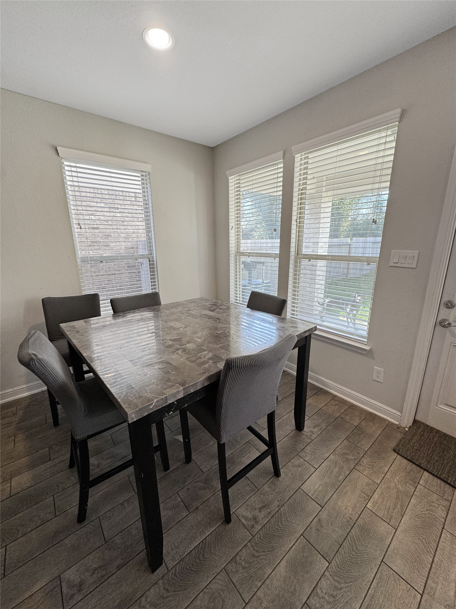 4922 Lacebark Pne Trail Rosenberg, TX 77471 - Photo 15 of 22 a view of a dining room with furniture and wooden floor